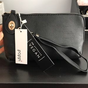 Poppi Faux leather wristlet/crossbag
